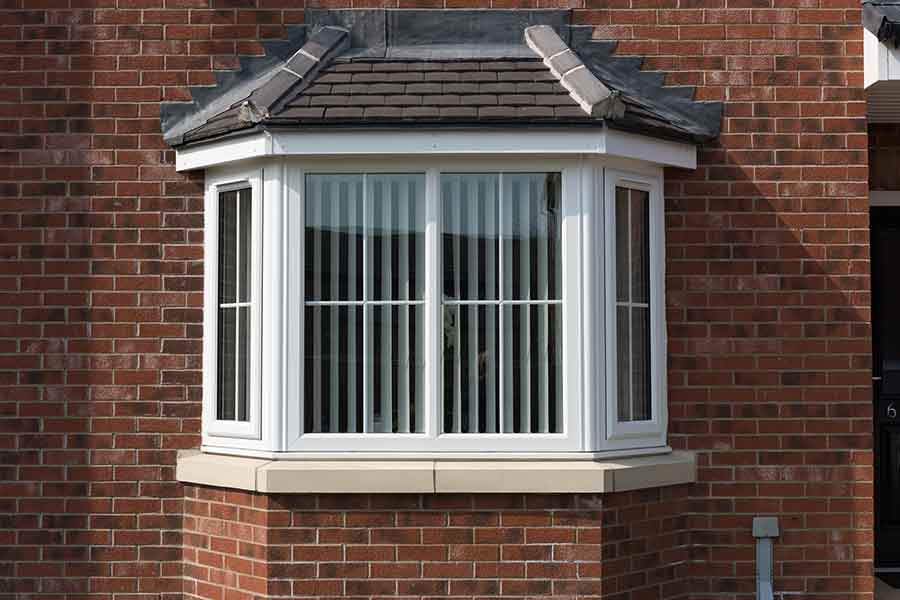 white 90 degree upvc bay window